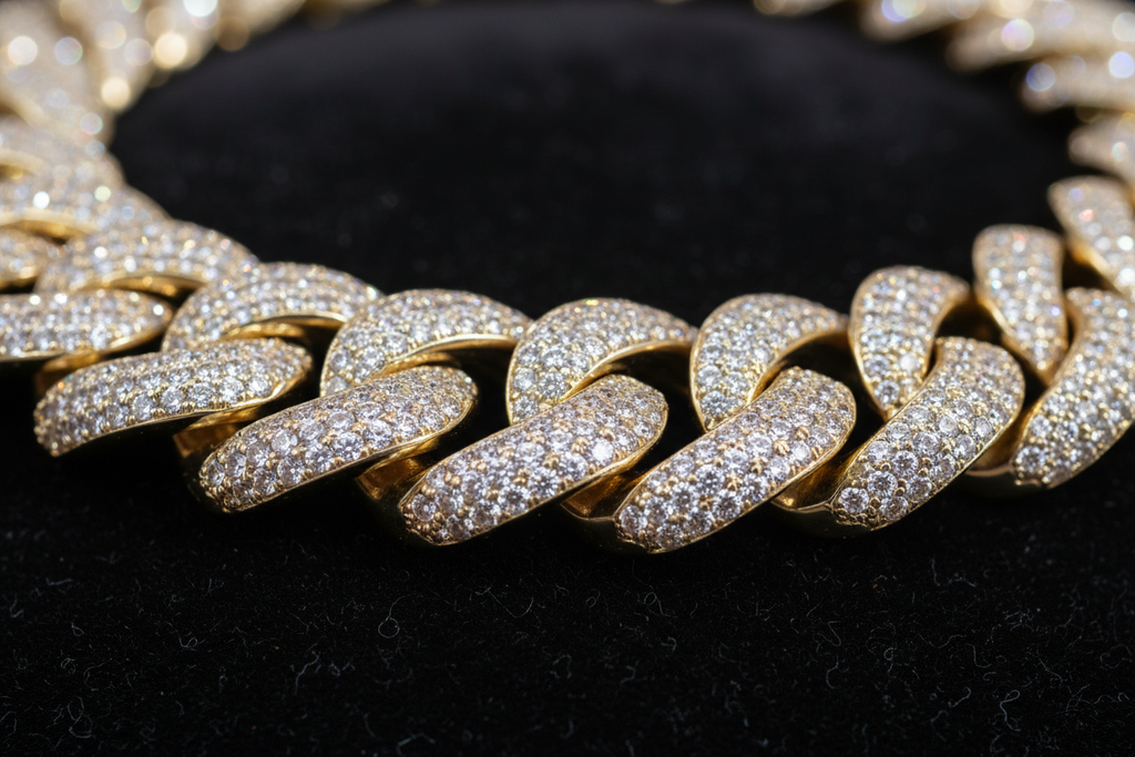 close up zoomed in pic of a gold cuban diamond plated chain